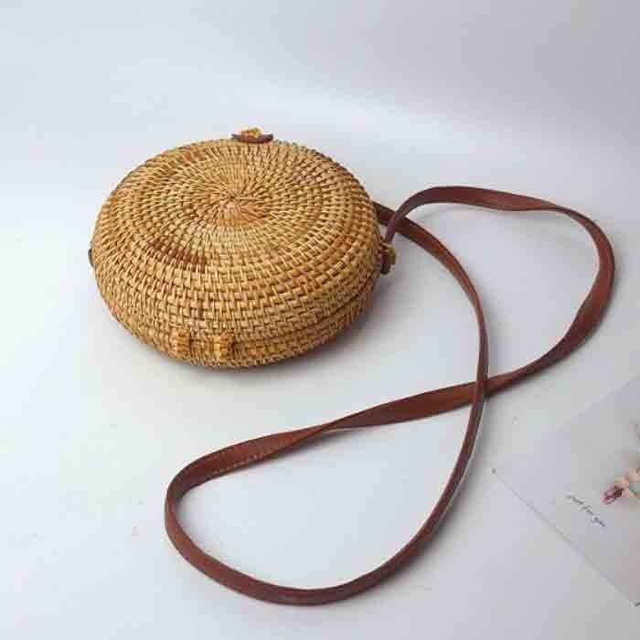 Round wicker bag made of straw and rattan