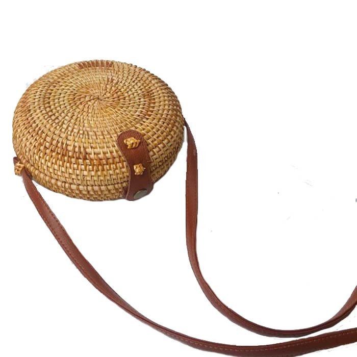 Round wicker bag made of straw and rattan