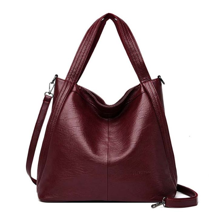 Women's bag with shoulder handles and strap