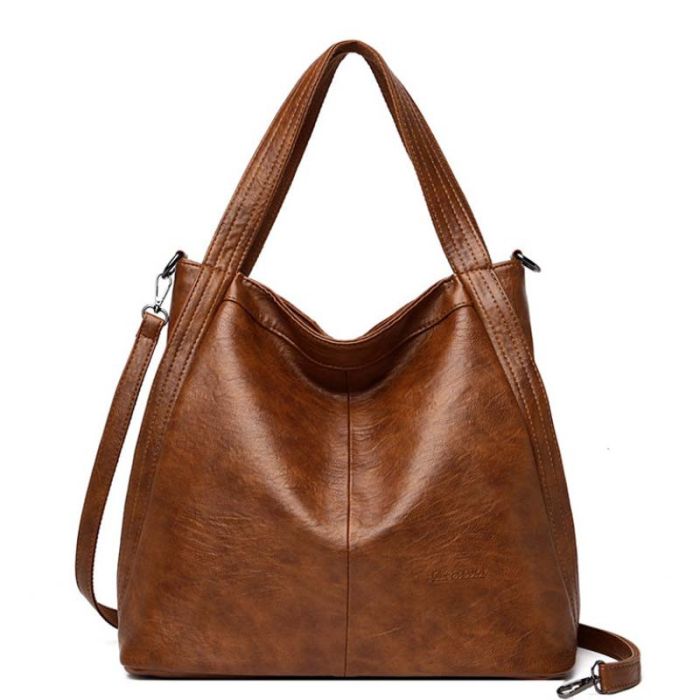 Women's bag with shoulder handles and strap