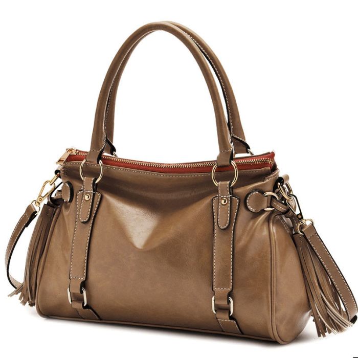 Women's bag with handles and tassels - a timeless classic