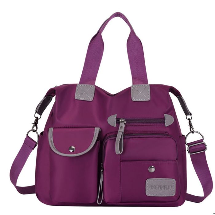 Women's bag made of waterproof fabric - many pockets