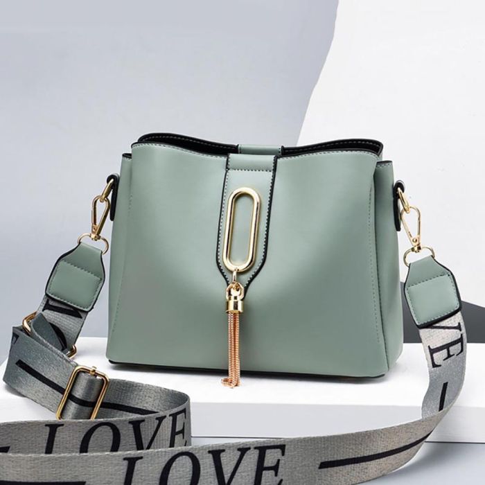 Small women's cross body shoulder bag with wide strap