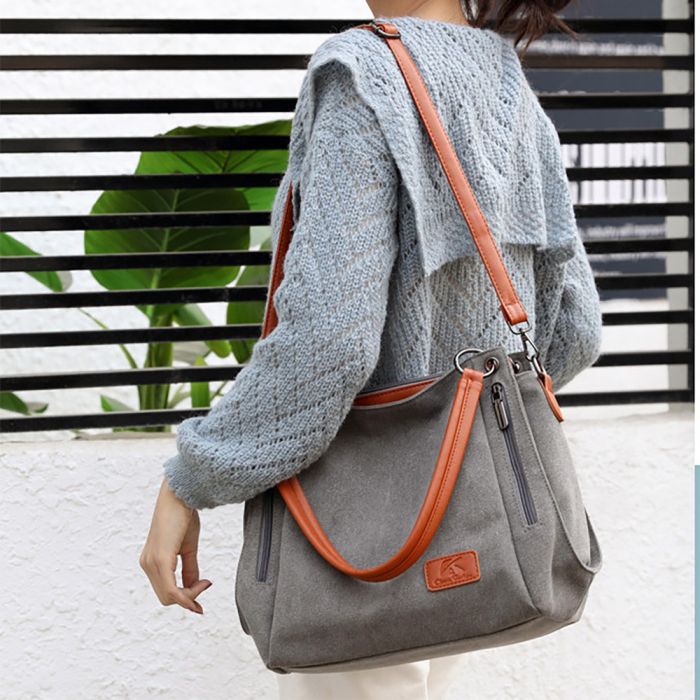 Women's fabric bag with contrasting leather strap