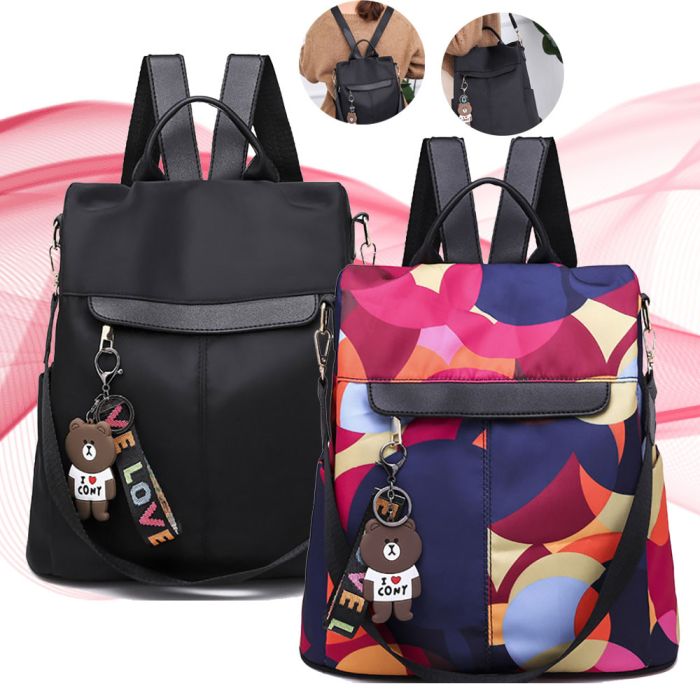 Women's backpack bag 2 in 1 - model black classic and multicolored abstraction